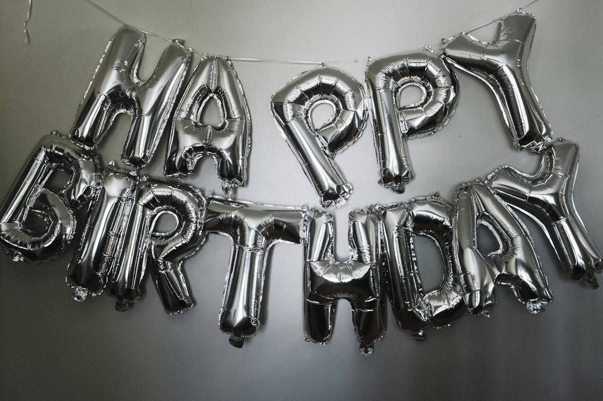 elegant baby shower anniversary decoration silver jubilee with heirloom silver trays and soft lighting